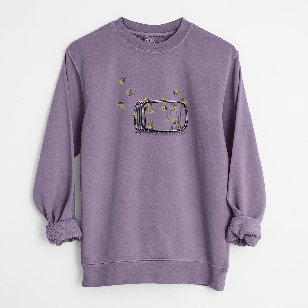 Plum purple pigment dyed crewneck sweatshirt laid flat with the sleeves rolled, printed with a mason jar with glowing yellow fireflies flying out of it.