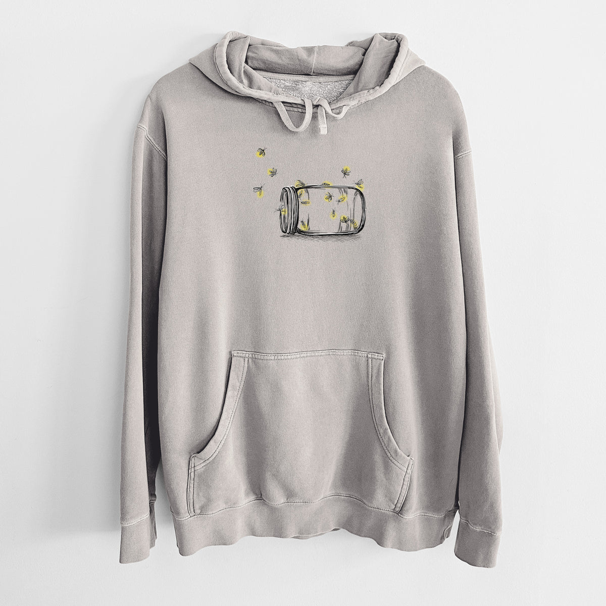 Cement grey pigment dyed hoodie laid flat, printed with a mason jar with glowing yellow fireflies flying out of it.