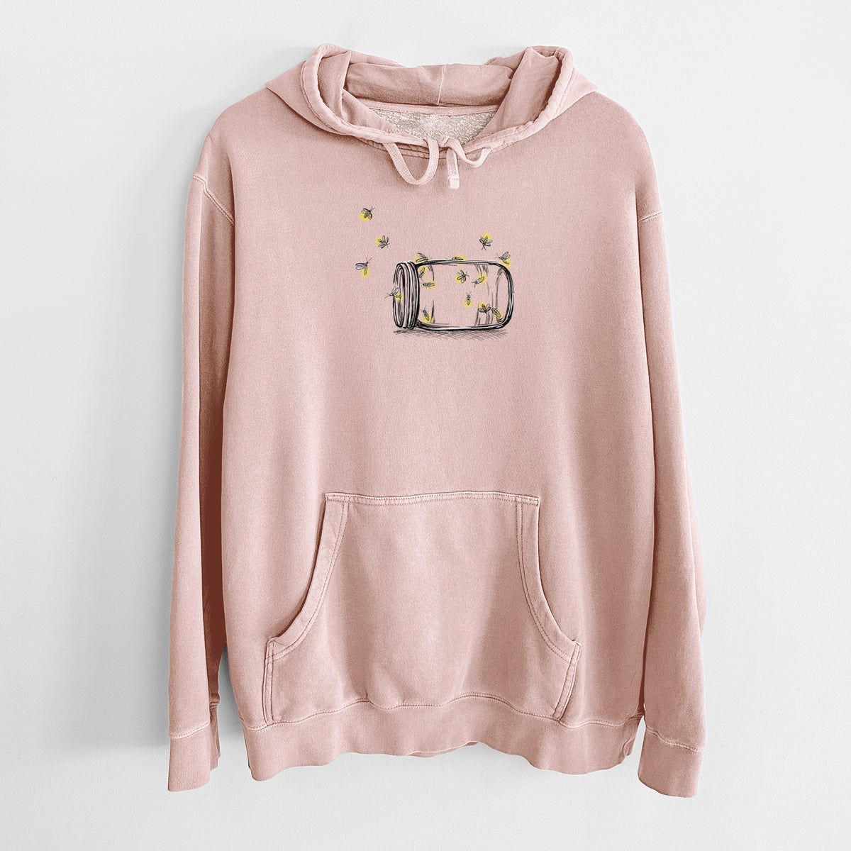 Dusty pink pigment dyed hoodie laid flat, printed with a mason jar with glowing yellow fireflies flying out of it.