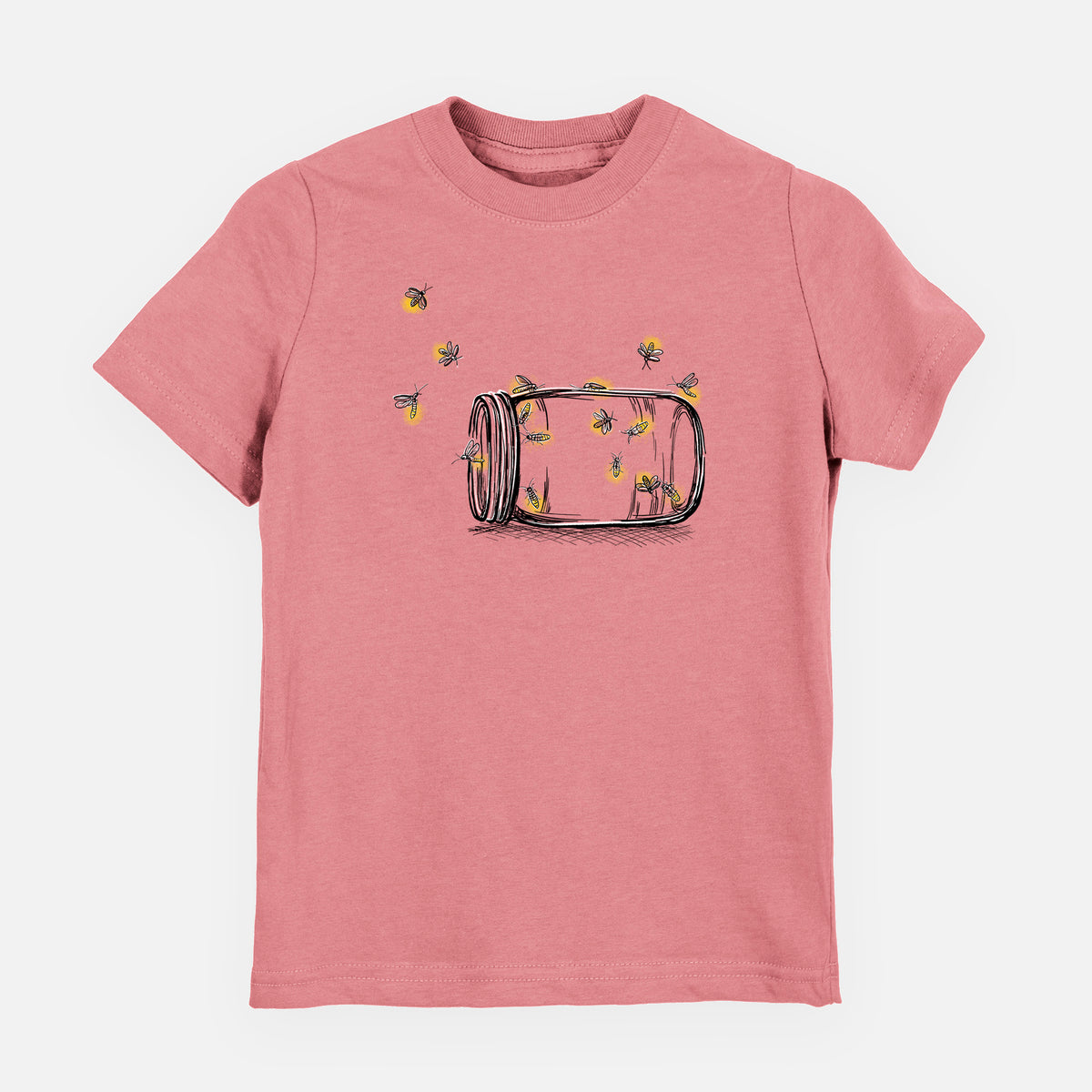 Mauve pink youth t-shirt laid flat, printed with a mason jar with glowing yellow fireflies flying out of it.