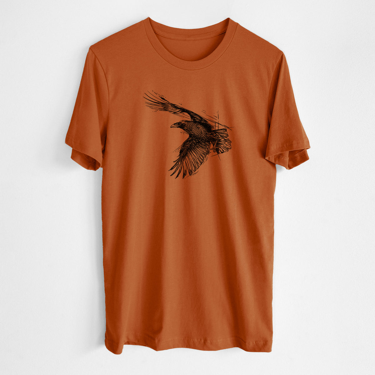 Autumn lightweight cotton t-shirt laid flat, printed with a black ink illustration of a raven in flight with its wings spread.
