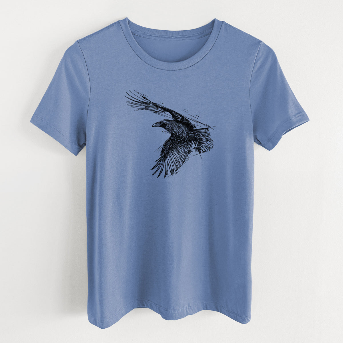 Blue bell women's relaxed fit cotton t-shirt laid flat, printed with a black ink illustration of a raven in flight with its wings spread.