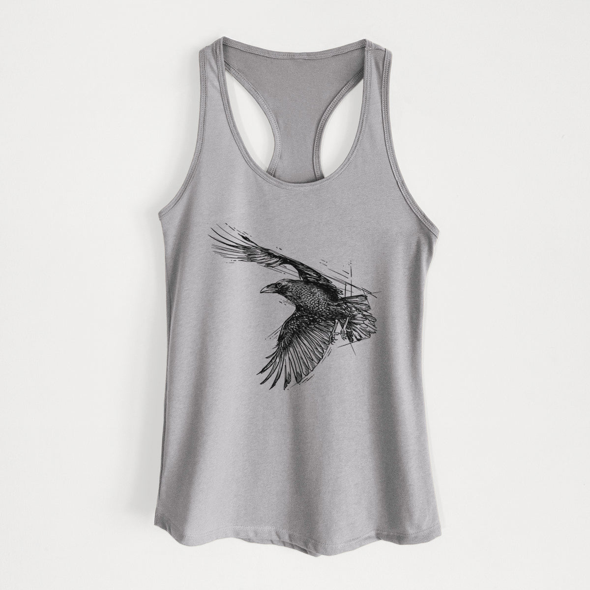 Heather grey women's racerback tank top laid flat, printed with a black ink illustration of a raven in flight with its wings spread.