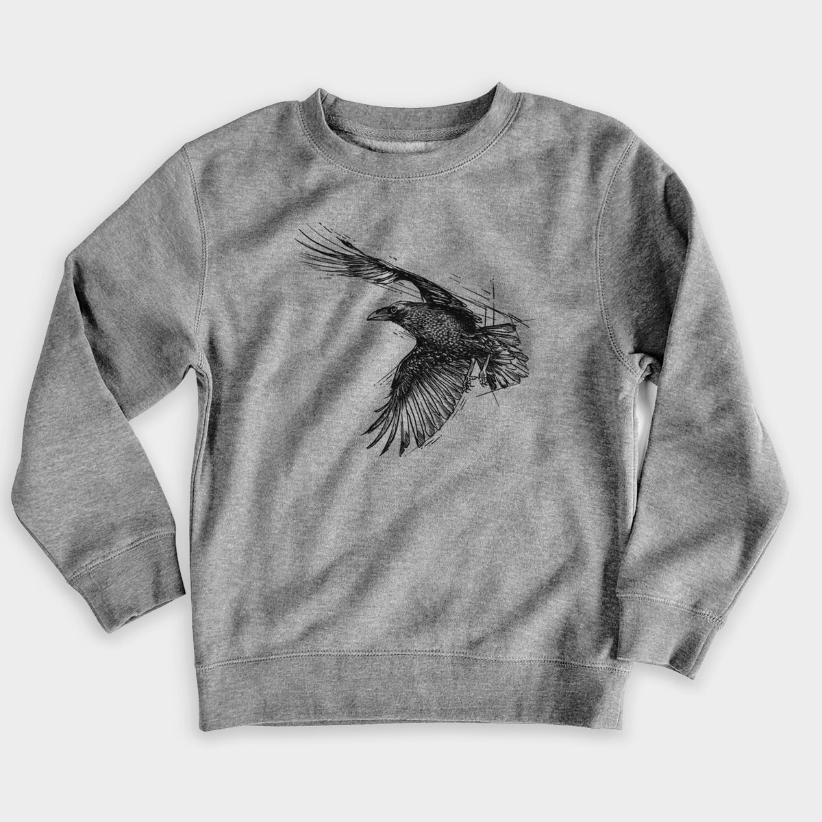 Nickel grey youth crewneck sweatshirt laid flat, printed with a black ink illustration of a raven in flight with its wings spread.