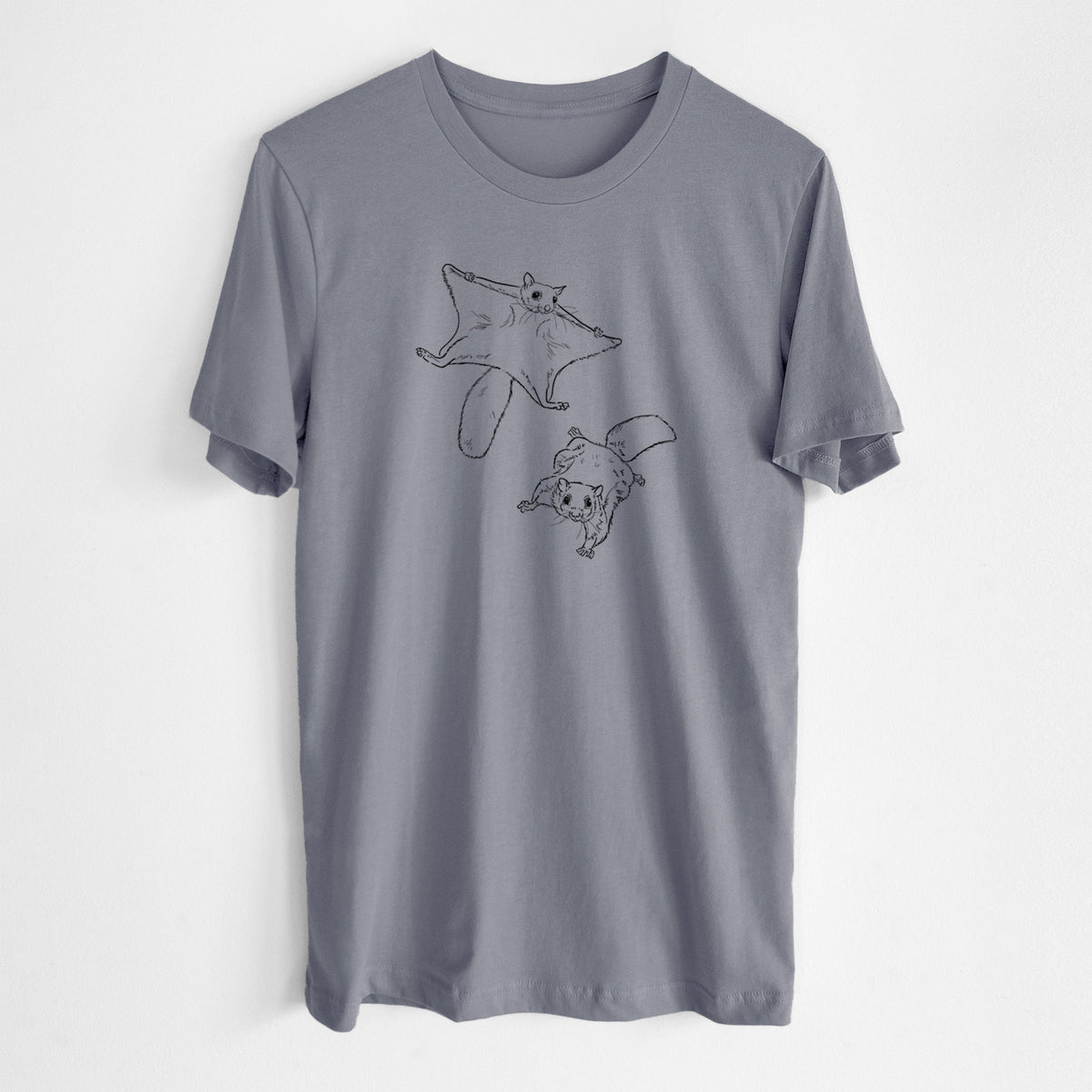 Storm grey lightweight cotton t-shirt laid flat, printed with a black ink illustration of two flying squirrels gliding with their skin flaps spread.