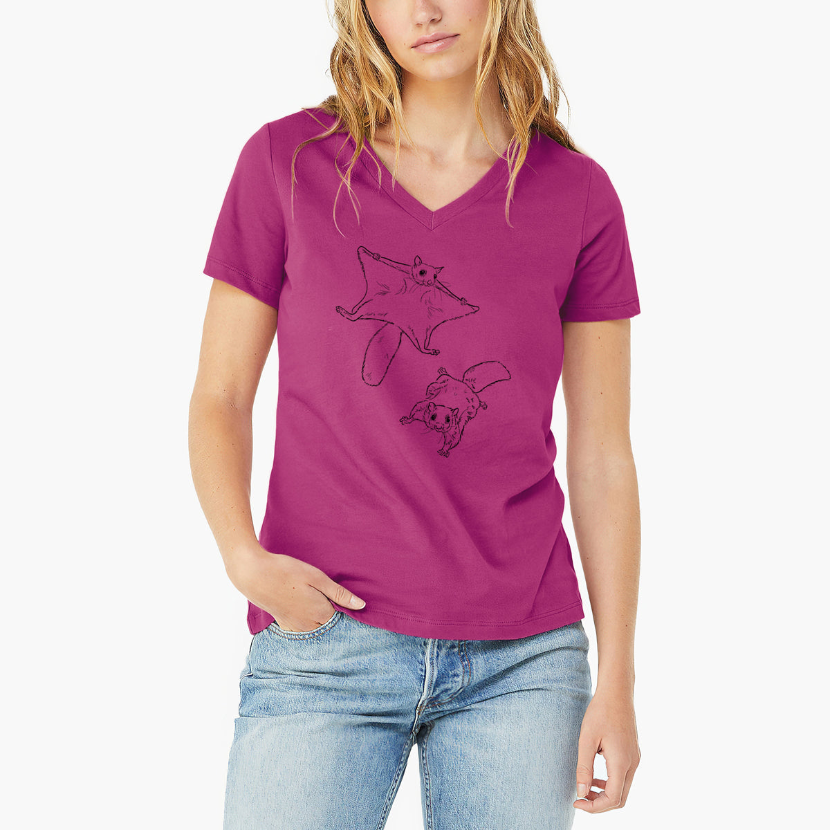 Woman wearing a berry pink women's relaxed fit cotton V-neck t-shirt printed with a black ink illustration of two flying squirrels gliding with their skin flaps spread.