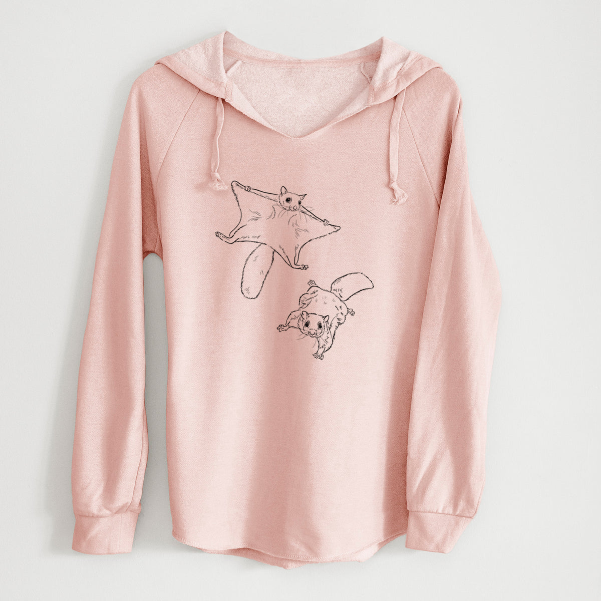 Blush pink women's Cali Wave hooded sweatshirt laid flat, printed with a black ink illustration of two flying squirrels gliding with their skin flaps spread.