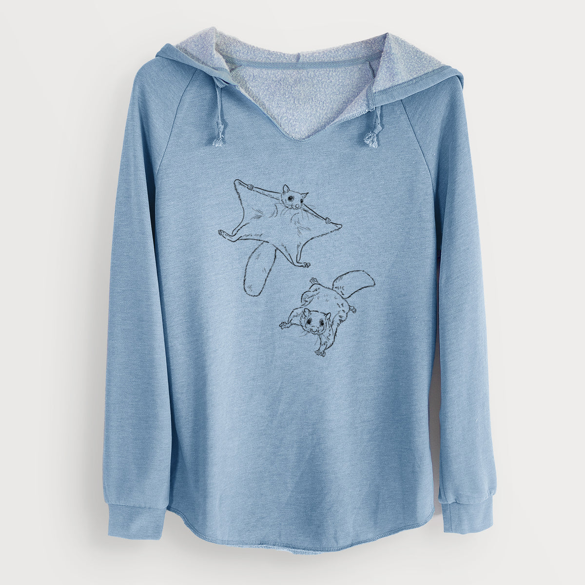 Misty blue women's Cali Wave hooded sweatshirt laid flat, printed with a black ink illustration of two flying squirrels gliding with their skin flaps spread.