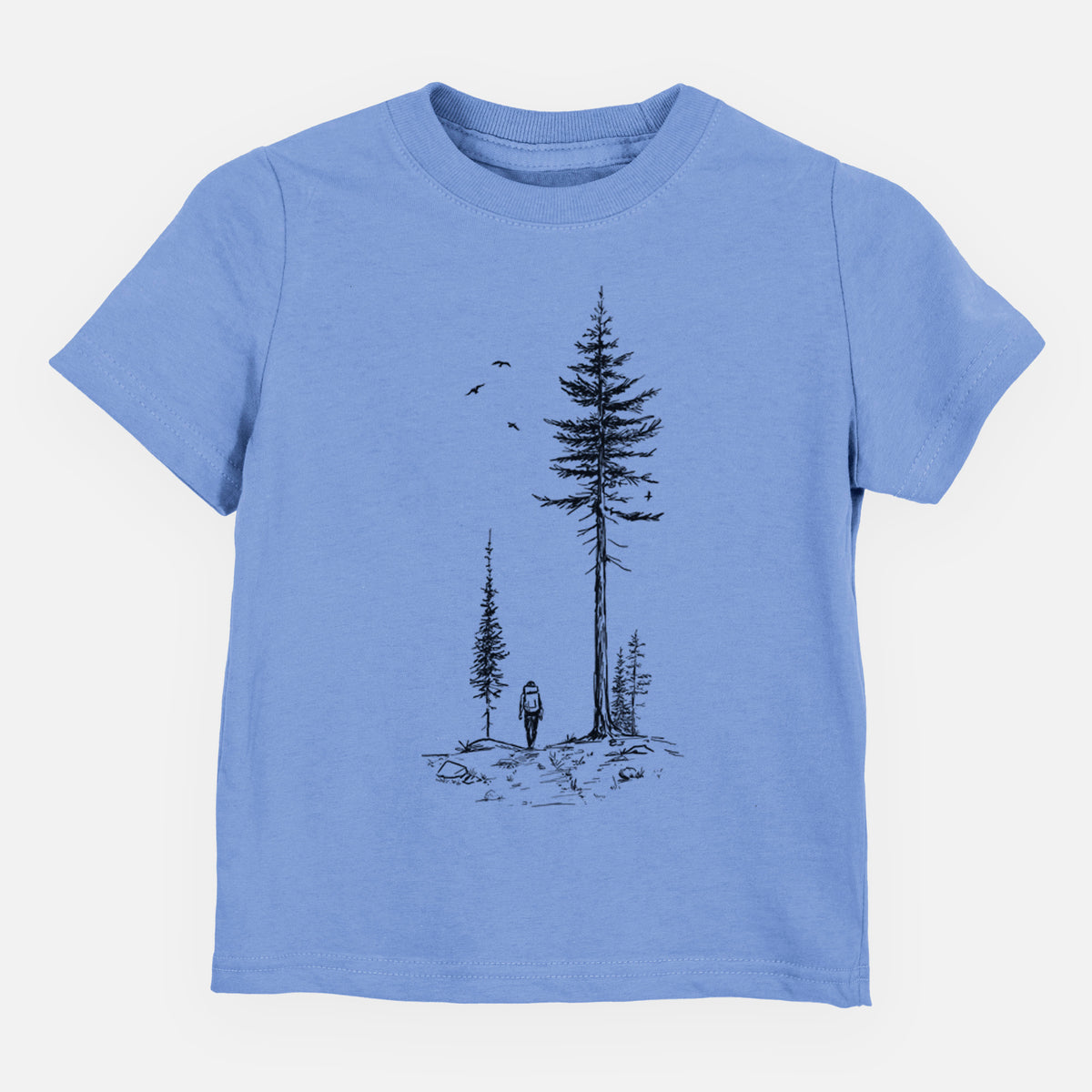 Carolina blue toddler t-shirt laid flat, printed with a black ink illustration of a lone hiker walking between tall pine trees with birds overhead.
