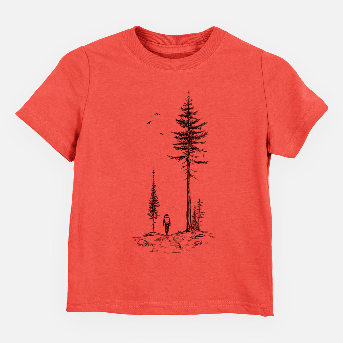 Passionfruit pink toddler t-shirt laid flat, printed with a black ink illustration of a lone hiker walking between tall pine trees with birds overhead.