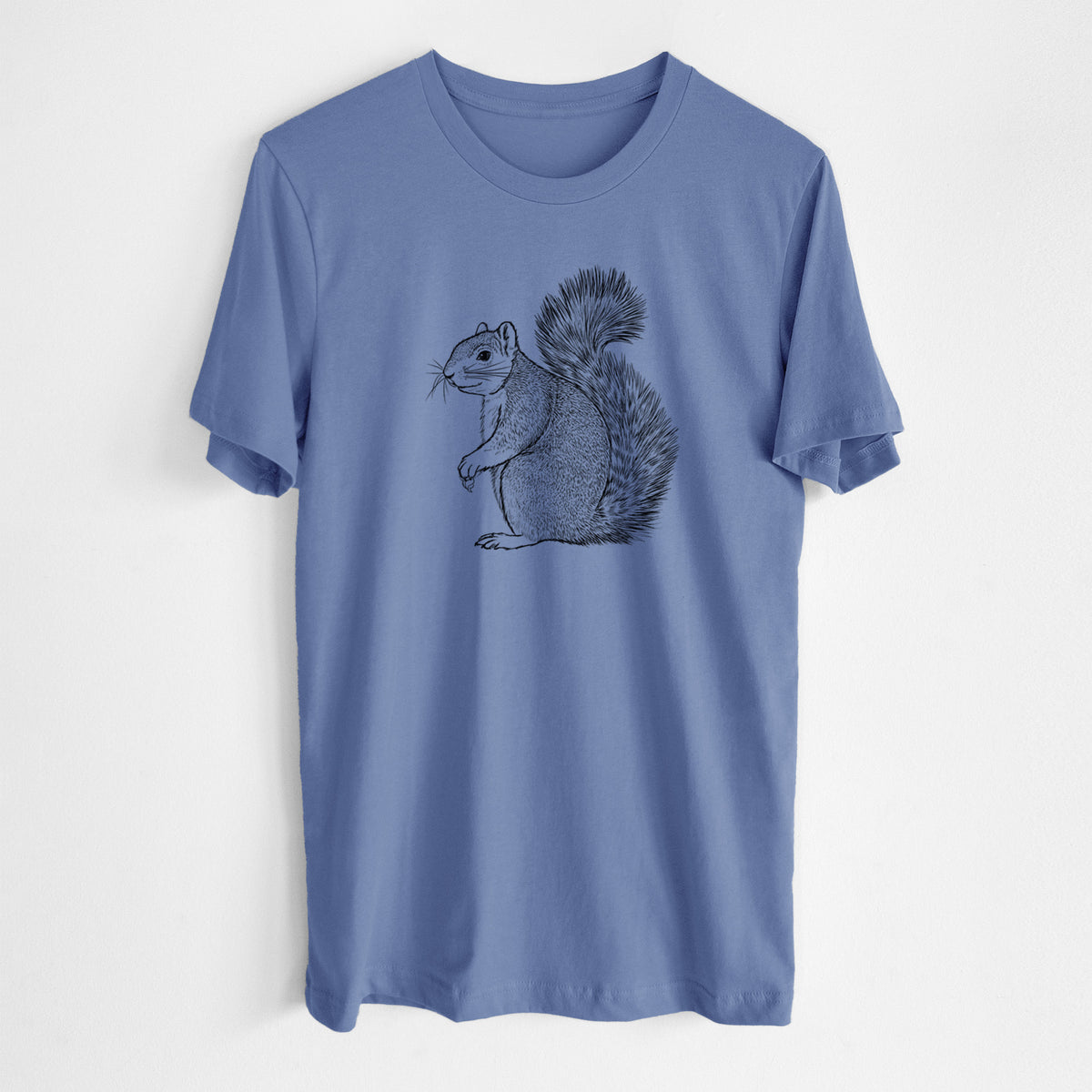 Blue bell lightweight cotton t-shirt laid flat, printed with a detailed black ink illustration of a fox squirrel sitting with a bushy tail.