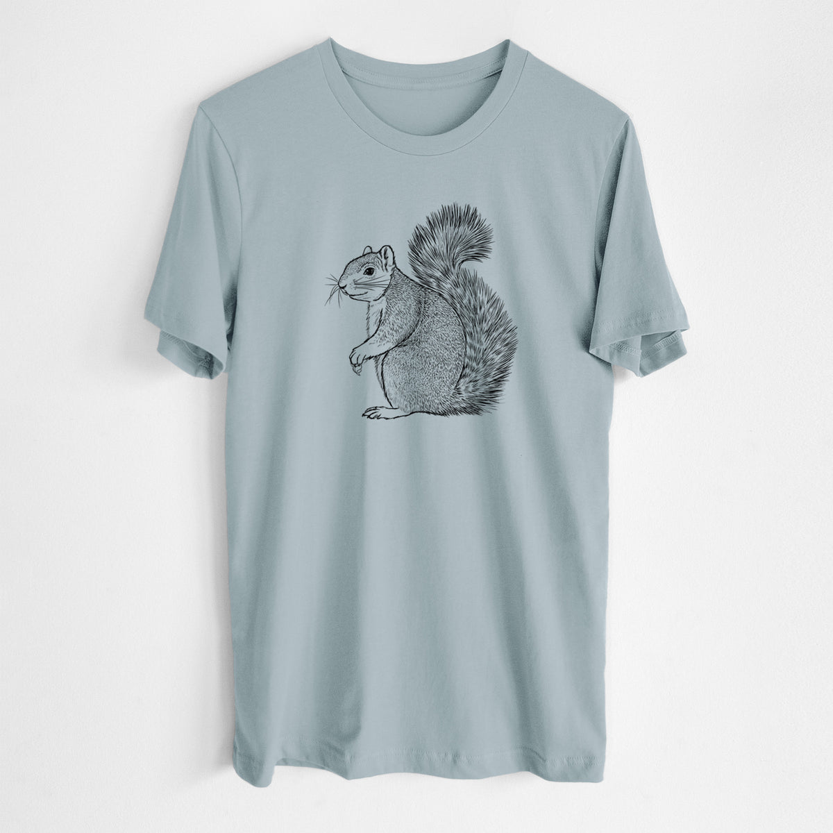 Vintage denim lightweight cotton t-shirt laid flat, printed with a detailed black ink illustration of a fox squirrel sitting with a bushy tail.