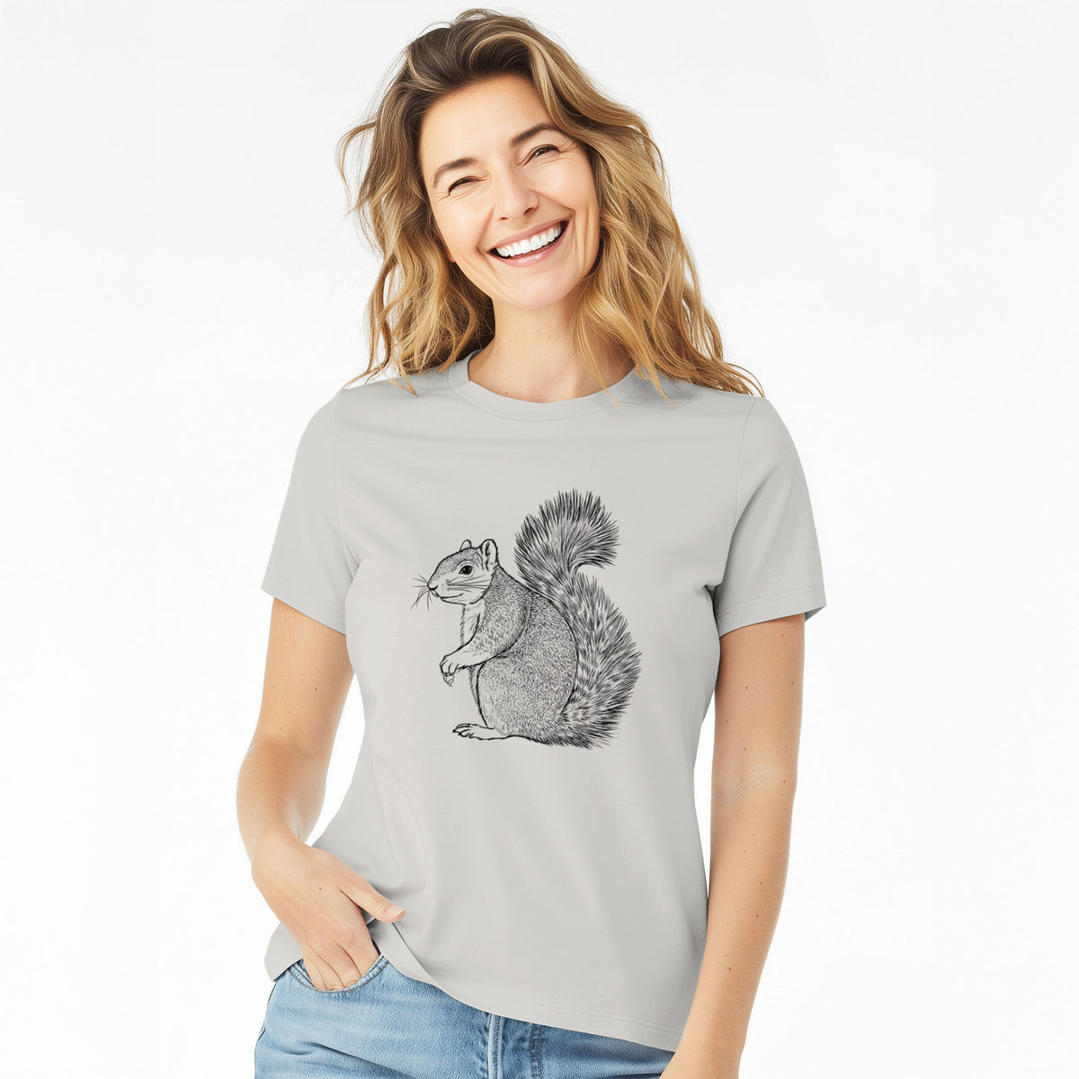 Woman wearing a lunar grey women's relaxed fit cotton t-shirt printed with a detailed black ink illustration of a fox squirrel sitting with a bushy tail.