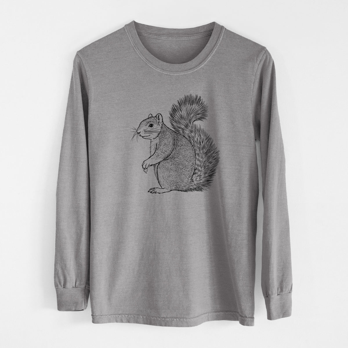 Grey Comfort Colors long sleeve shirt laid flat, printed with a detailed black ink illustration of a fox squirrel sitting with a bushy tail.
