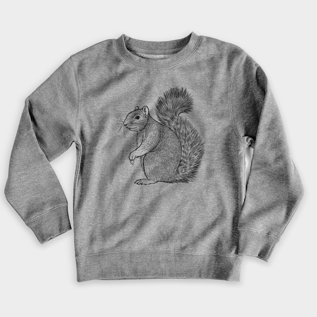 Nickel grey youth crewneck sweatshirt laid flat, printed with a detailed black ink illustration of a fox squirrel sitting with a bushy tail.