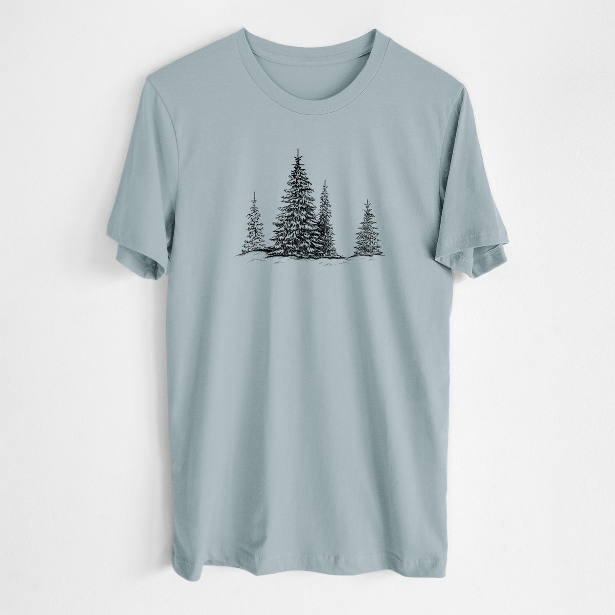 Vintage denim lightweight cotton t-shirt laid flat, printed with a black ink illustration of frost-covered evergreen trees.