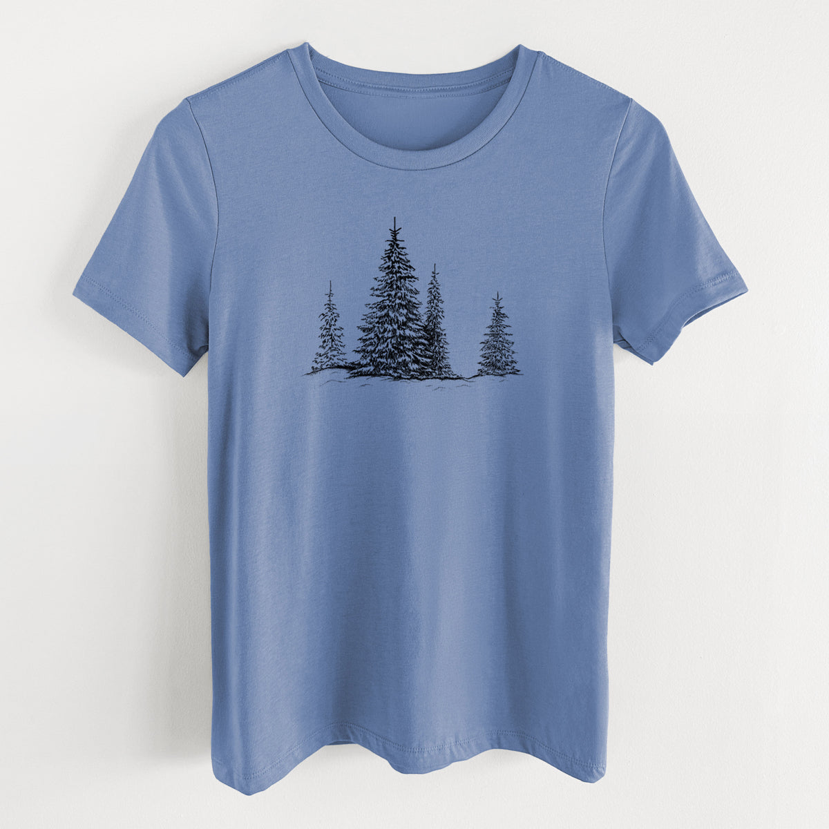 Blue bell women's relaxed fit cotton t-shirt laid flat, printed with a black ink illustration of frost-covered evergreen trees.