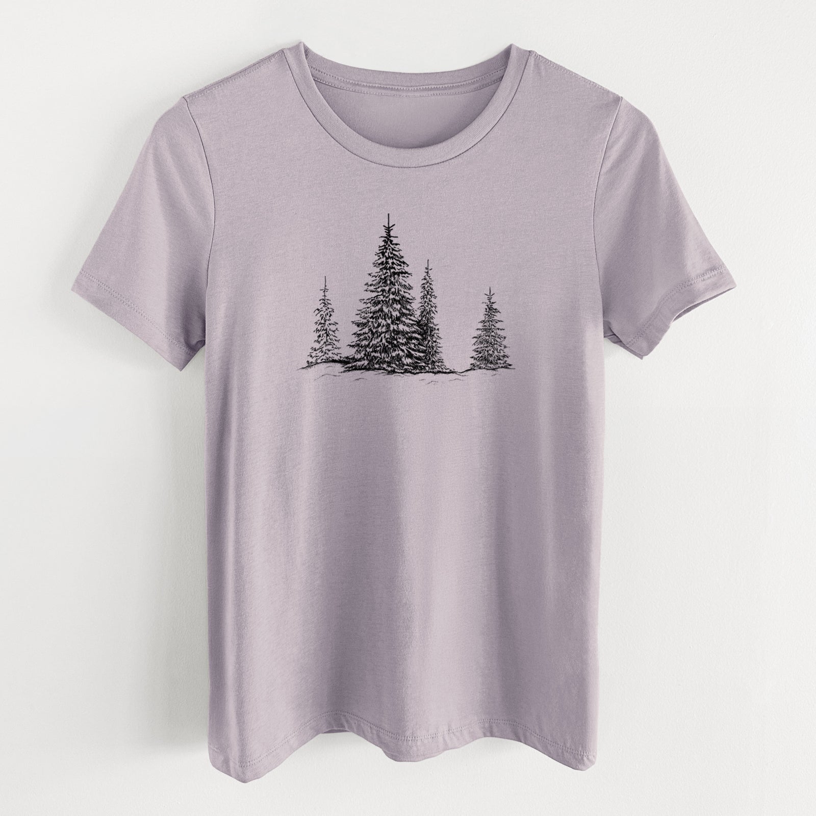 Light violet women's relaxed fit cotton t-shirt laid flat, printed with a black ink illustration of frost-covered evergreen trees.