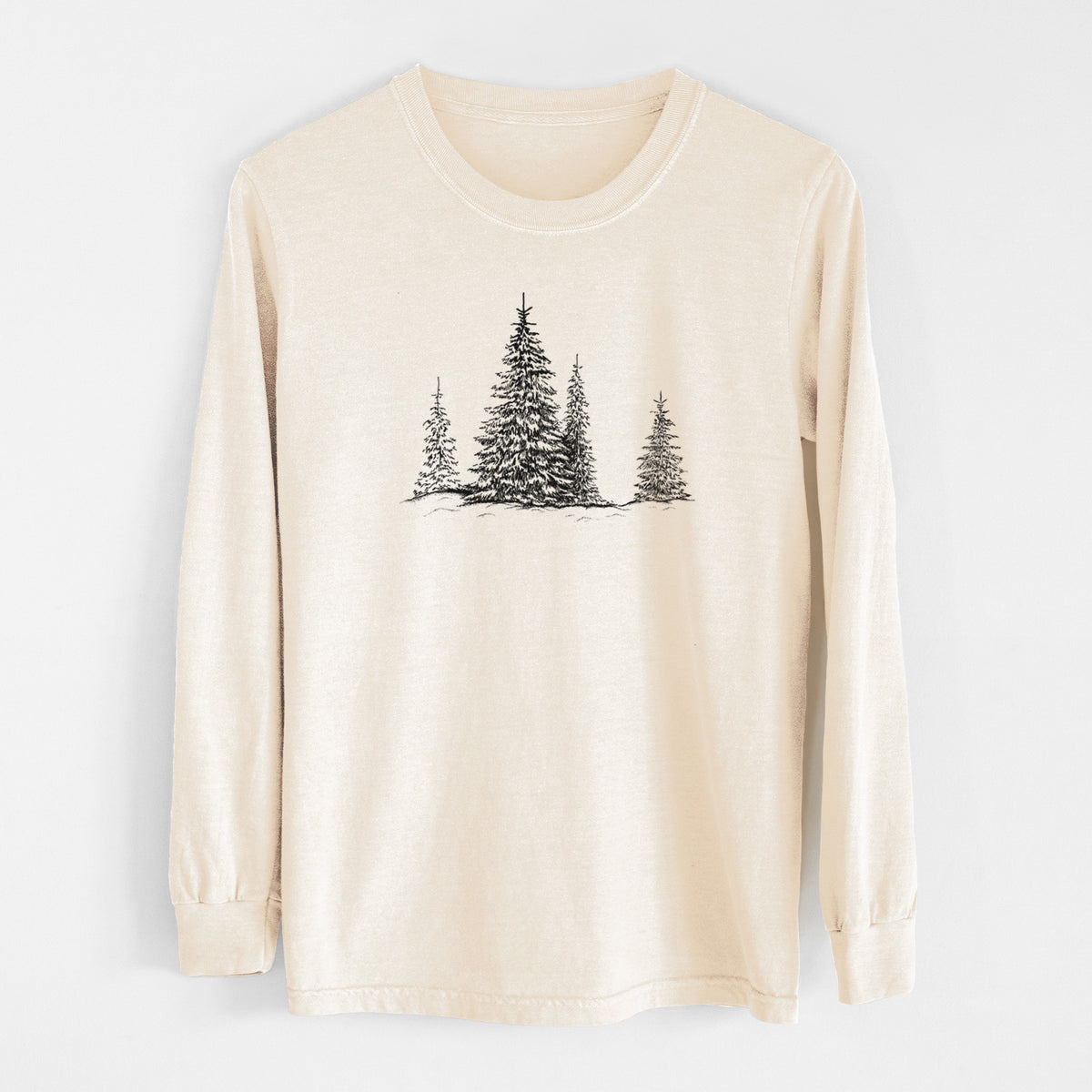 Ivory Comfort Colors long sleeve shirt laid flat, printed with a black ink illustration of frost-covered evergreen trees.