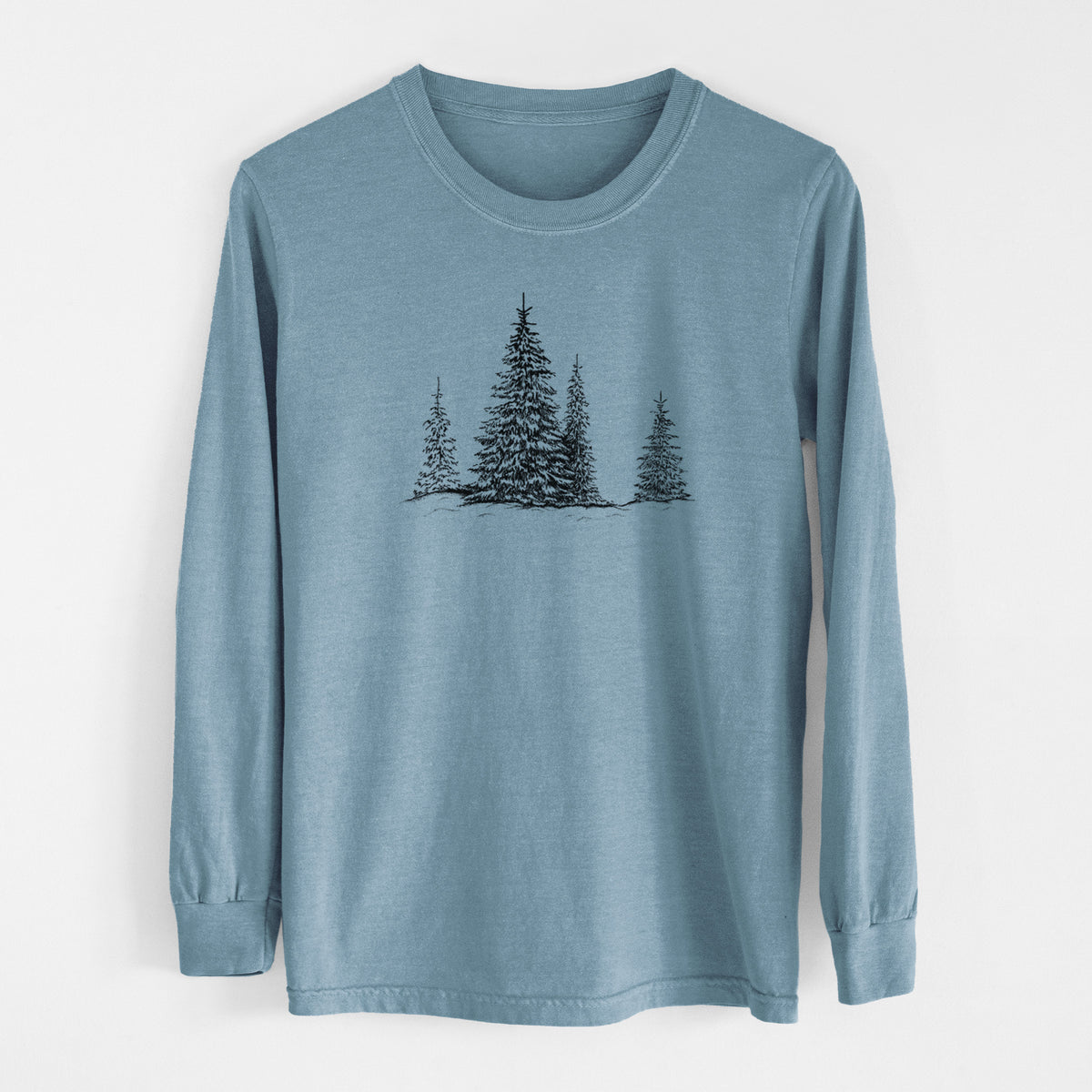 Steel blue Comfort Colors long sleeve shirt laid flat, printed with a black ink illustration of frost-covered evergreen trees.