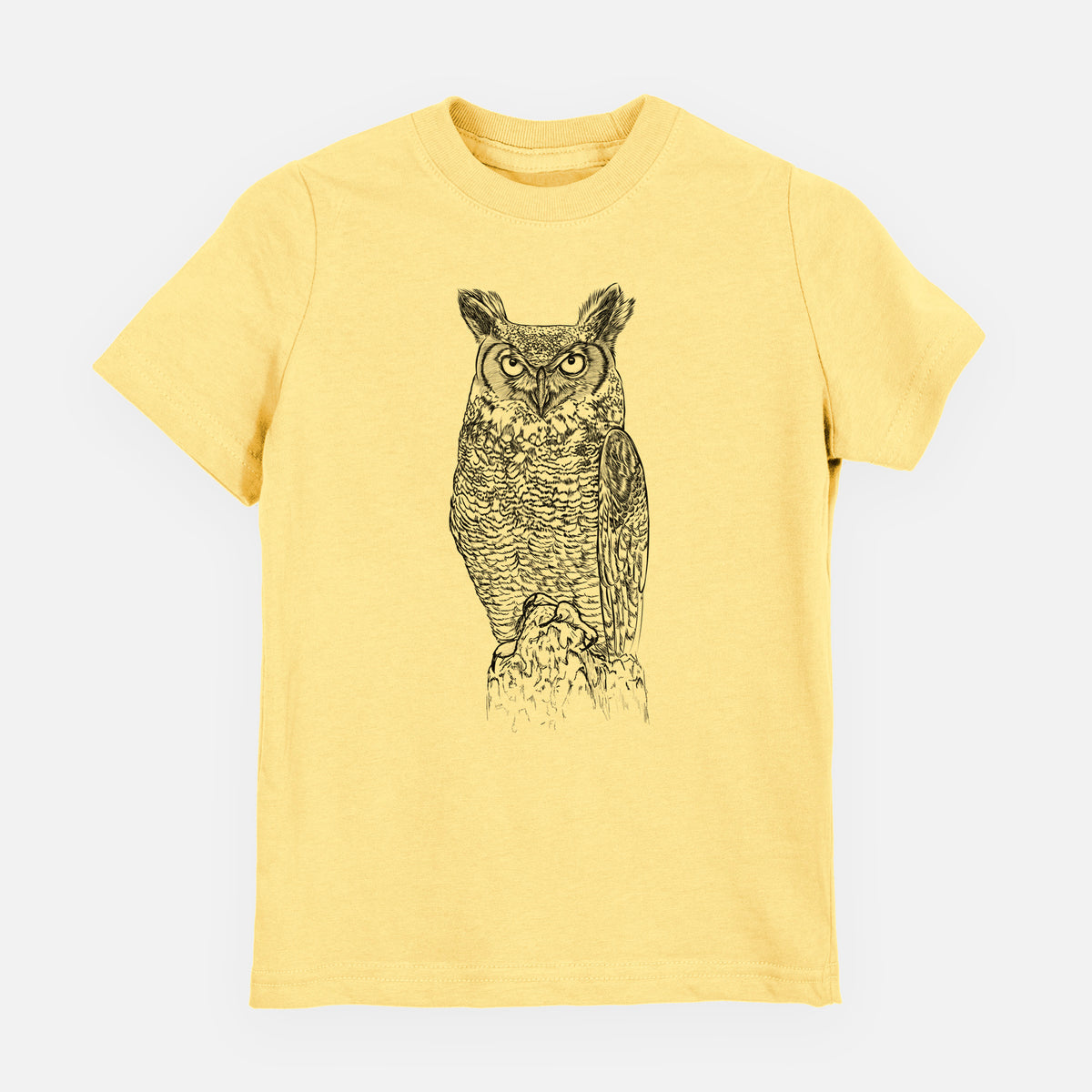 Butter yellow youth t-shirt laid flat, printed with a detailed black ink illustration of a great horned owl standing upright with its ear tufts raised.