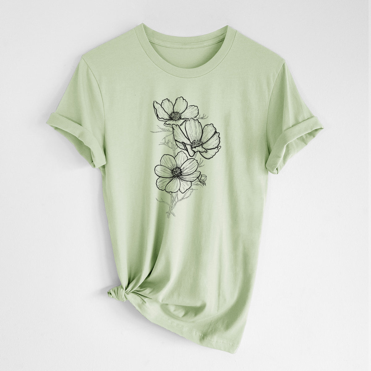 Spring green lightweight cotton t-shirt laid flat with the sleeves rolled, printed with a black ink line drawing of garden cosmos flowers on stems.