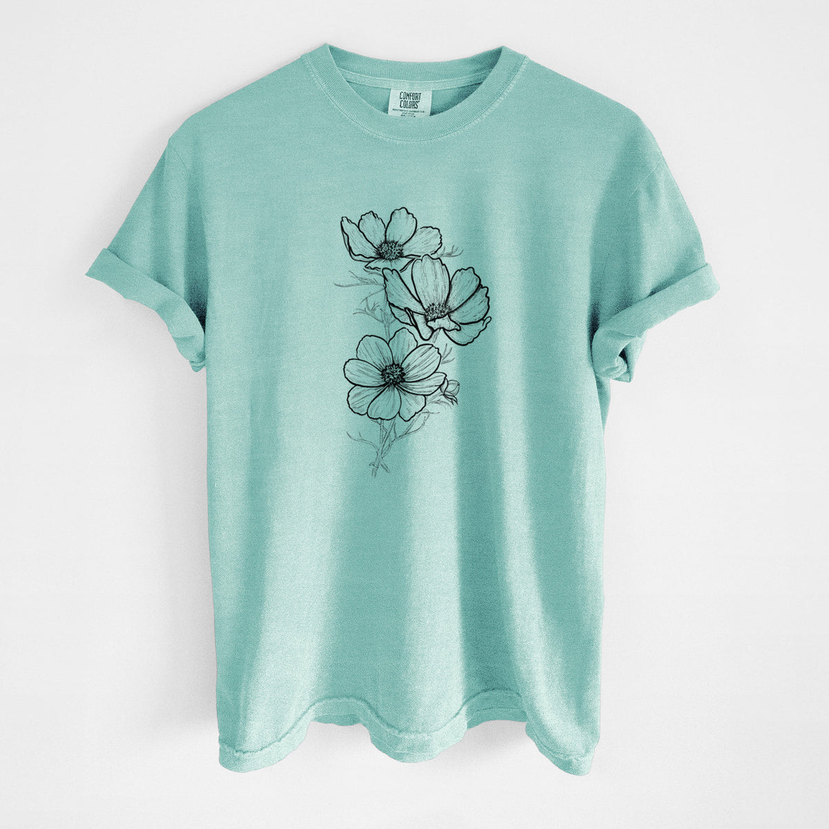 Chalky mint Comfort Colors t-shirt laid flat, printed with a black ink line drawing of garden cosmos flowers on stems.