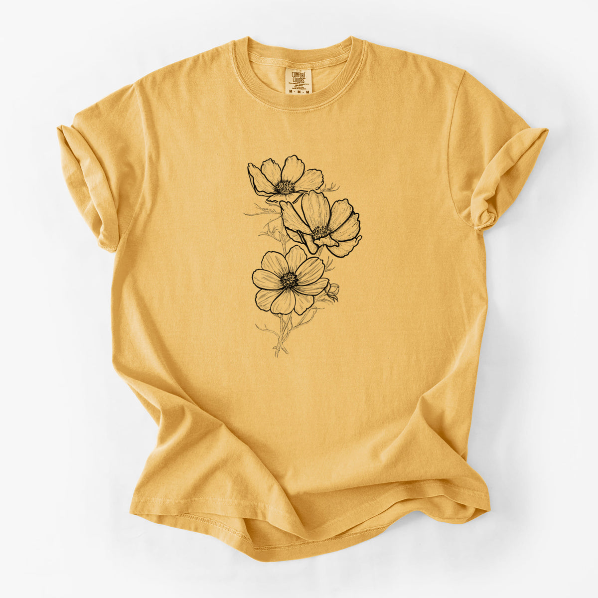 Golden wheat yellow Comfort Colors t-shirt laid flat, printed with a black ink line drawing of garden cosmos flowers on stems.