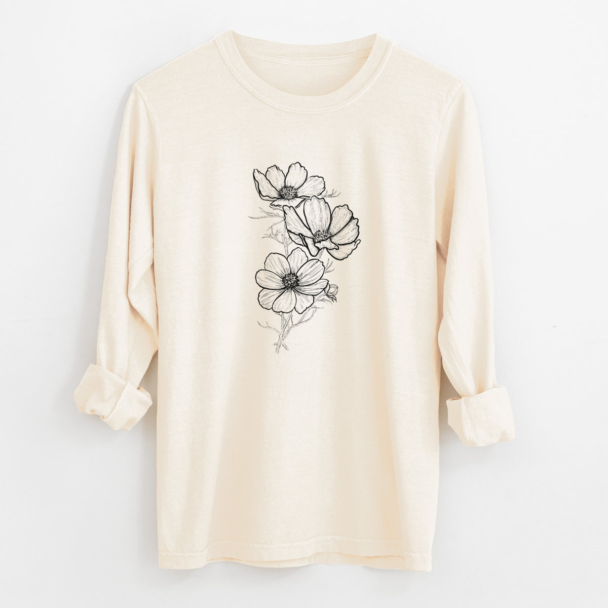 Ivory Comfort Colors long sleeve shirt laid flat with the cuffs rolled, printed with a black ink line drawing of garden cosmos flowers on stems.