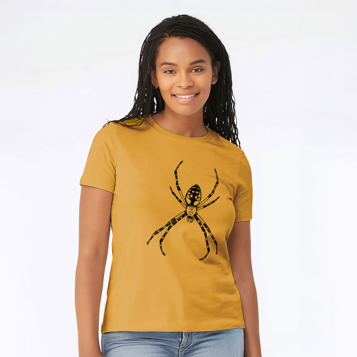 Woman wearing a mustard yellow women's relaxed fit cotton t-shirt printed with a detailed black ink illustration of a garden spider with long striped legs.
