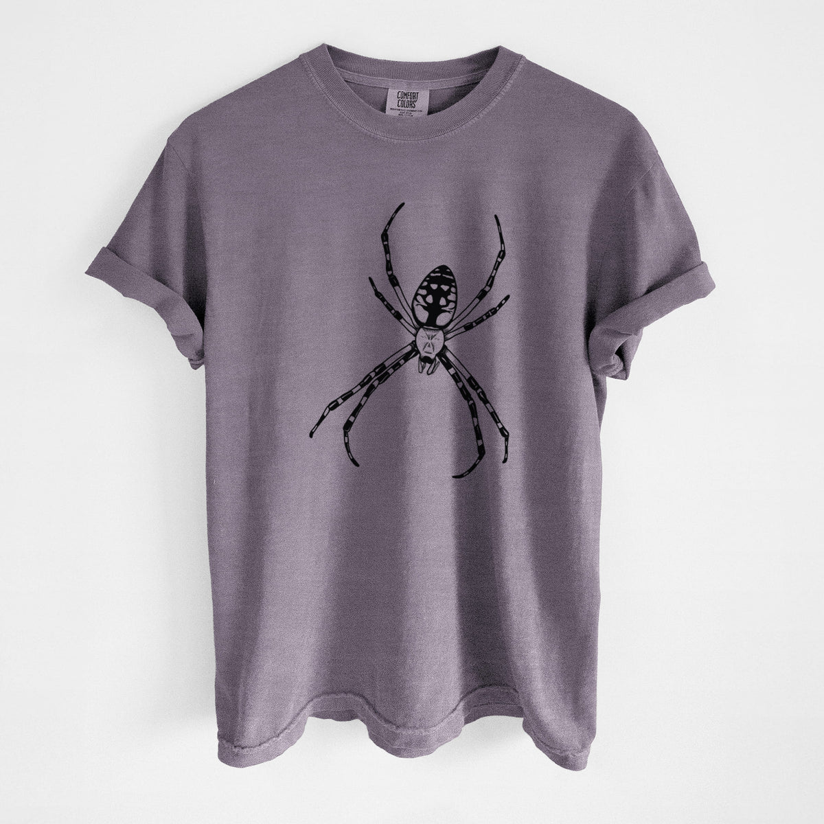 Wine red Comfort Colors t-shirt laid flat, printed with a detailed black ink illustration of a garden spider with long striped legs.