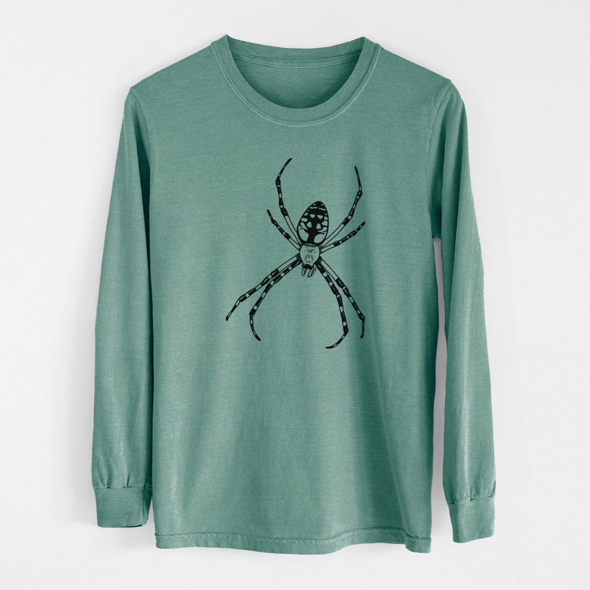 Pine green Comfort Colors long sleeve shirt laid flat, printed with a detailed black ink illustration of a garden spider with long striped legs.