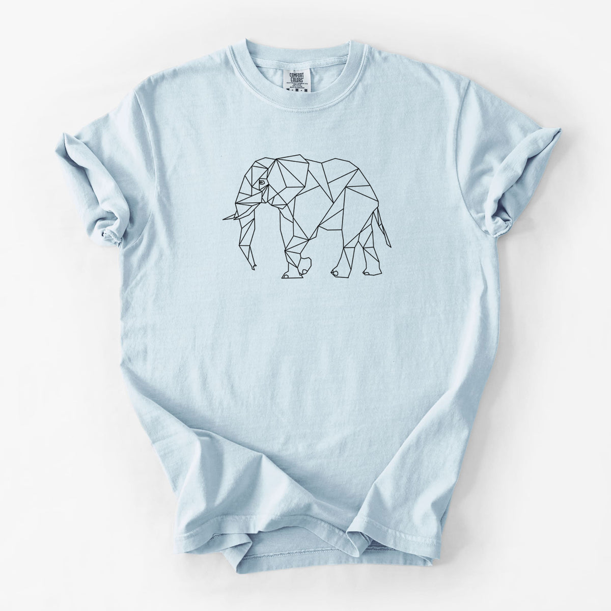 Chambray blue Comfort Colors t-shirt laid flat, printed with a black geometric line art elephant.