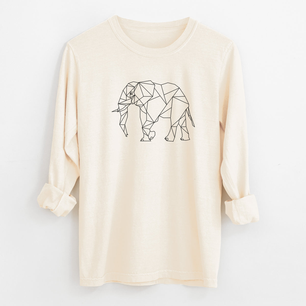 Ivory Comfort Colors long sleeve shirt laid flat with the cuffs rolled, printed with a black geometric line art elephant.