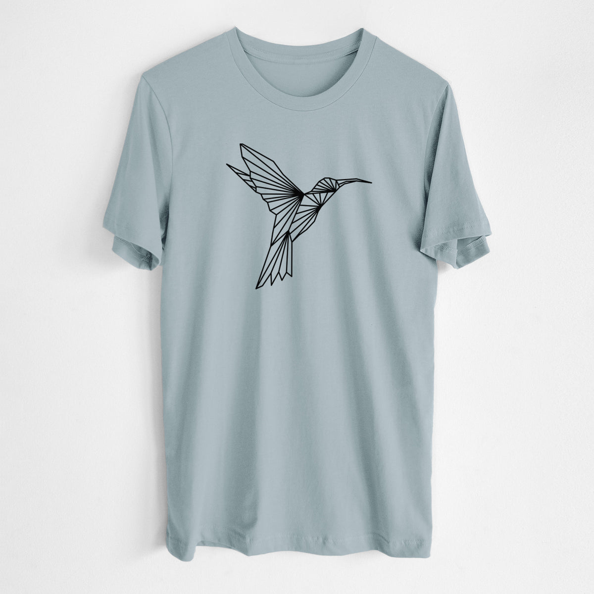 Vintage denim lightweight cotton t-shirt laid flat, printed with a black geometric line art hummingbird in flight.