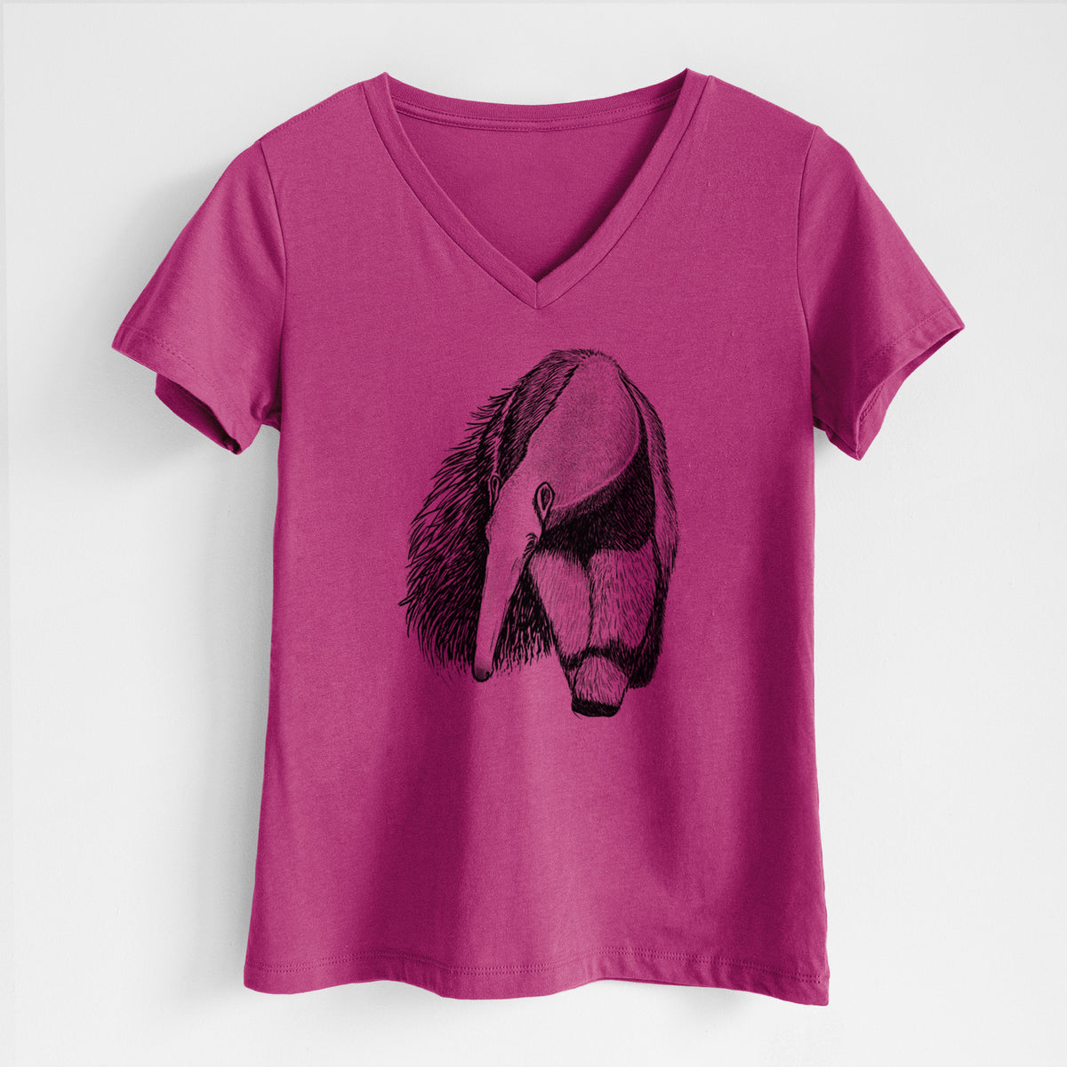 Berry pink women's relaxed fit cotton V-neck t-shirt laid flat, printed with a detailed black ink illustration of a giant anteater with its long snout and bushy tail.