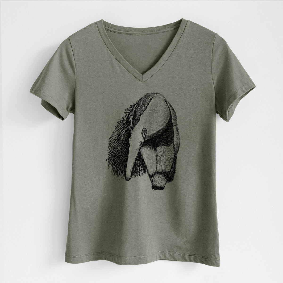 Military green women's relaxed fit cotton V-neck t-shirt laid flat, printed with a detailed black ink illustration of a giant anteater with its long snout and bushy tail.