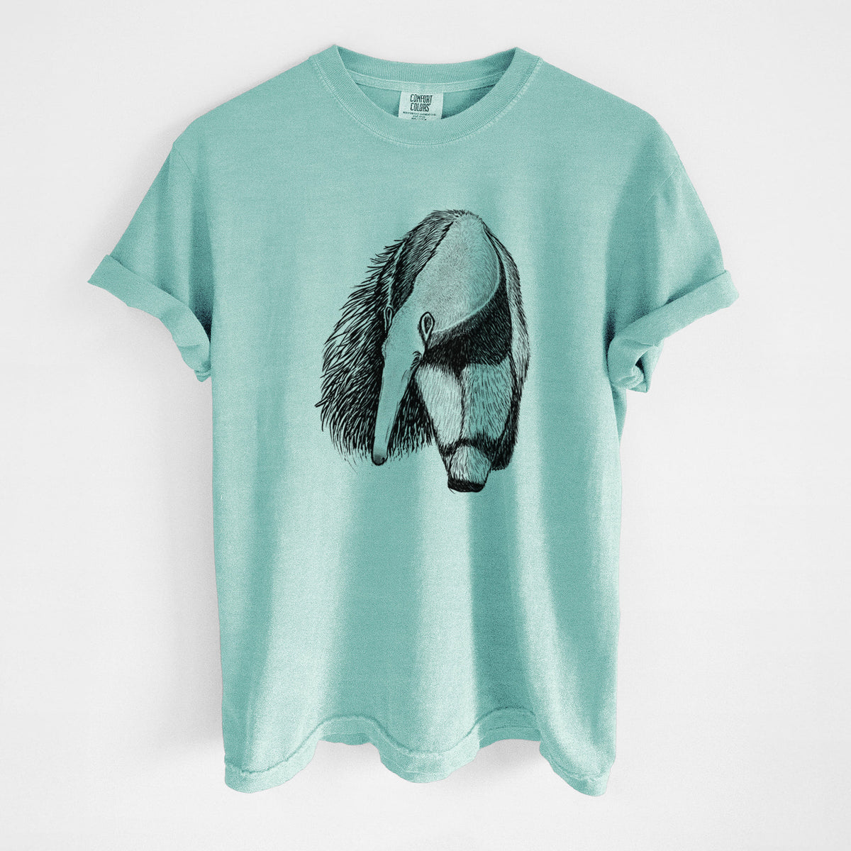 Chalky mint Comfort Colors t-shirt laid flat, printed with a detailed black ink illustration of a giant anteater with its long snout and bushy tail.