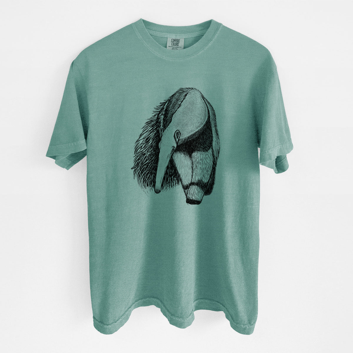 Reef green Comfort Colors t-shirt laid flat, printed with a detailed black ink illustration of a giant anteater with its long snout and bushy tail.
