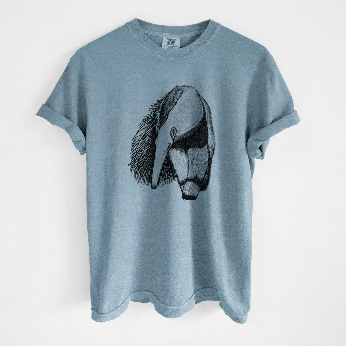 Steel blue Comfort Colors t-shirt laid flat, printed with a detailed black ink illustration of a giant anteater with its long snout and bushy tail.