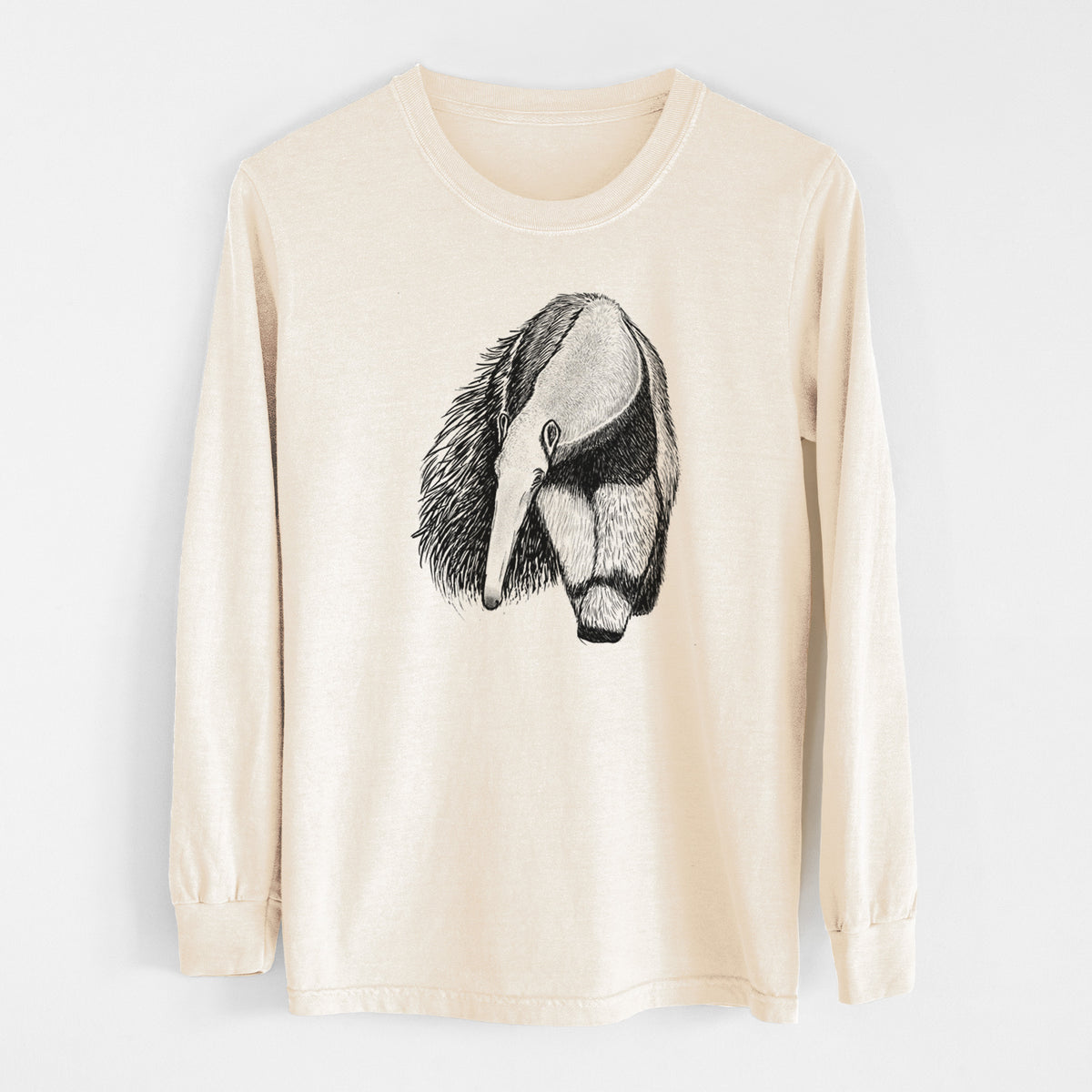 Ivory Comfort Colors long sleeve shirt laid flat, printed with a detailed black ink illustration of a giant anteater with its long snout and bushy tail.