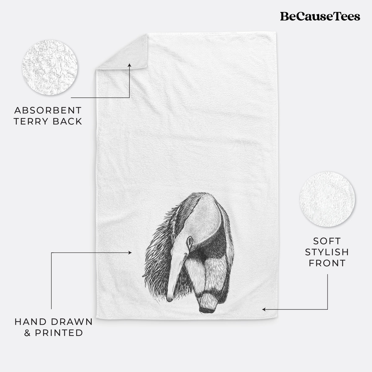 White hand towel printed with a detailed black ink illustration of a giant anteater with its long snout and bushy tail.