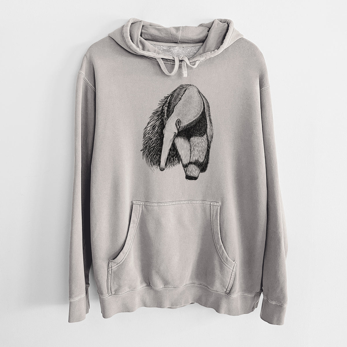 Cement grey pigment dyed hoodie laid flat, printed with a detailed black ink illustration of a giant anteater with its long snout and bushy tail.
