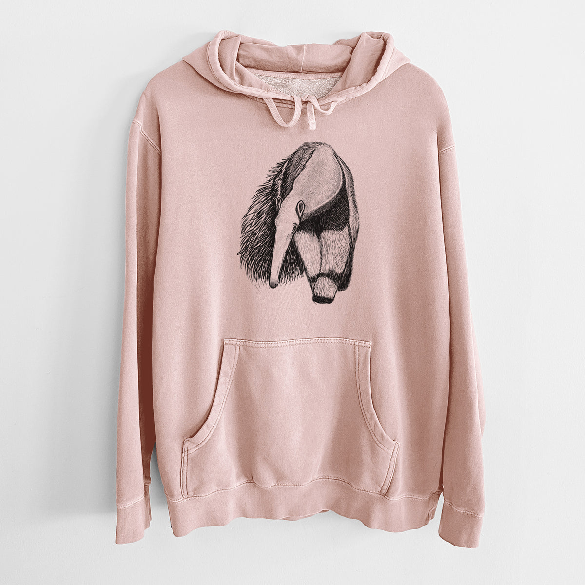 Dusty pink pigment dyed hoodie laid flat, printed with a detailed black ink illustration of a giant anteater with its long snout and bushy tail.