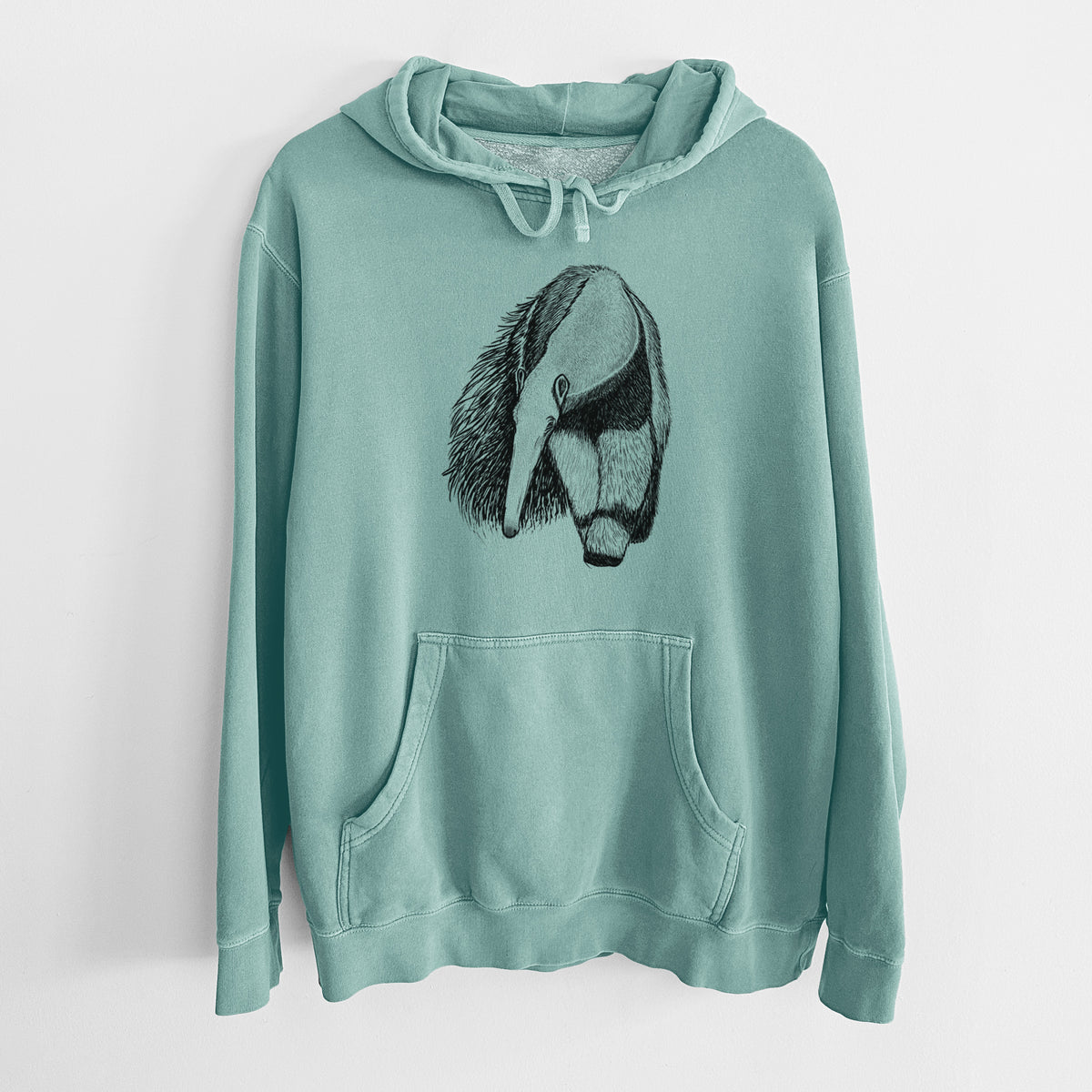 Mint green pigment dyed hoodie laid flat, printed with a detailed black ink illustration of a giant anteater with its long snout and bushy tail.