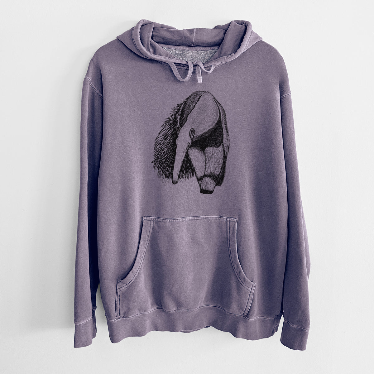 Plum purple pigment dyed hoodie laid flat, printed with a detailed black ink illustration of a giant anteater with its long snout and bushy tail.