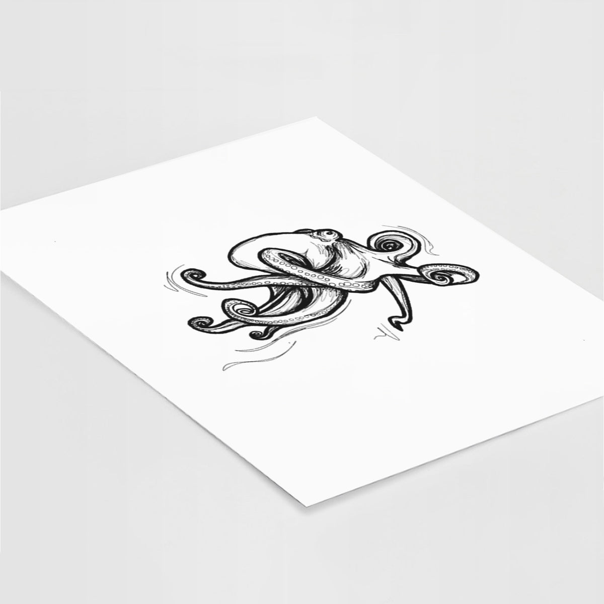 Art print of a black ink illustration of a giant Pacific octopus with curling tentacles, lying at an angle on a white surface.