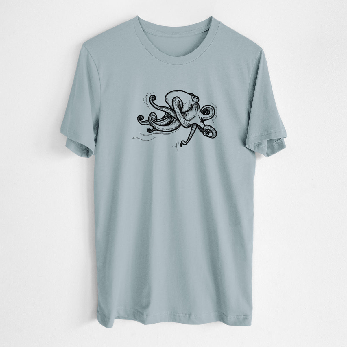 Vintage denim lightweight cotton t-shirt laid flat, printed with a black ink illustration of a giant Pacific octopus with curling tentacles.