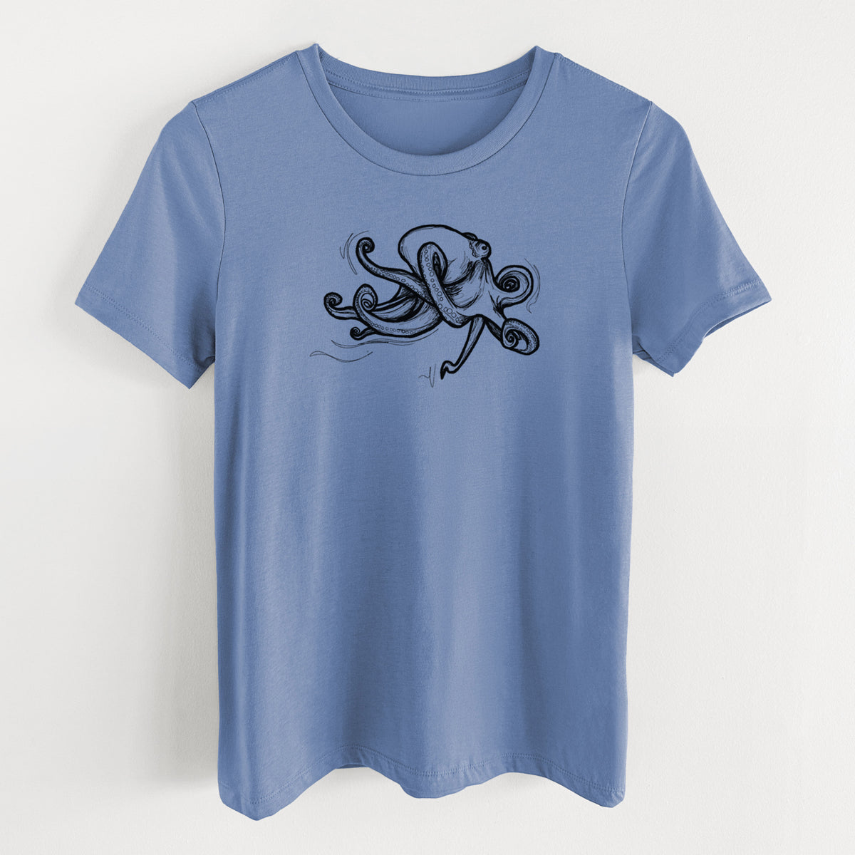 Blue bell women's relaxed fit cotton t-shirt laid flat, printed with a black ink illustration of a giant Pacific octopus with curling tentacles.