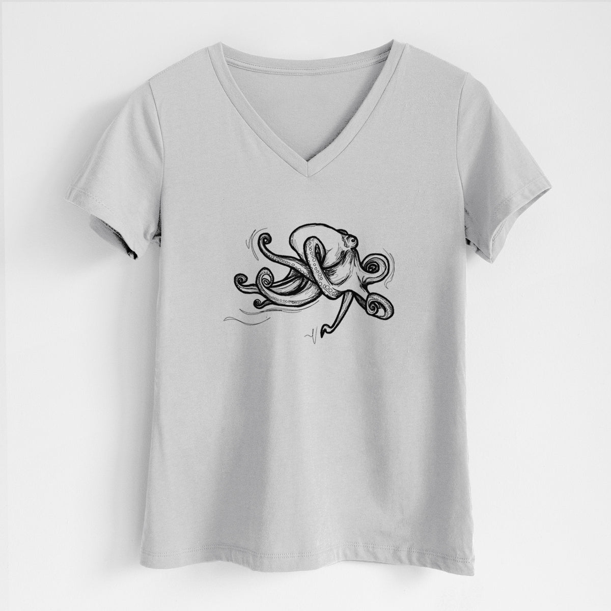 Lunar grey women's relaxed fit cotton V-neck t-shirt laid flat, printed with a black ink illustration of a giant Pacific octopus with curling tentacles.